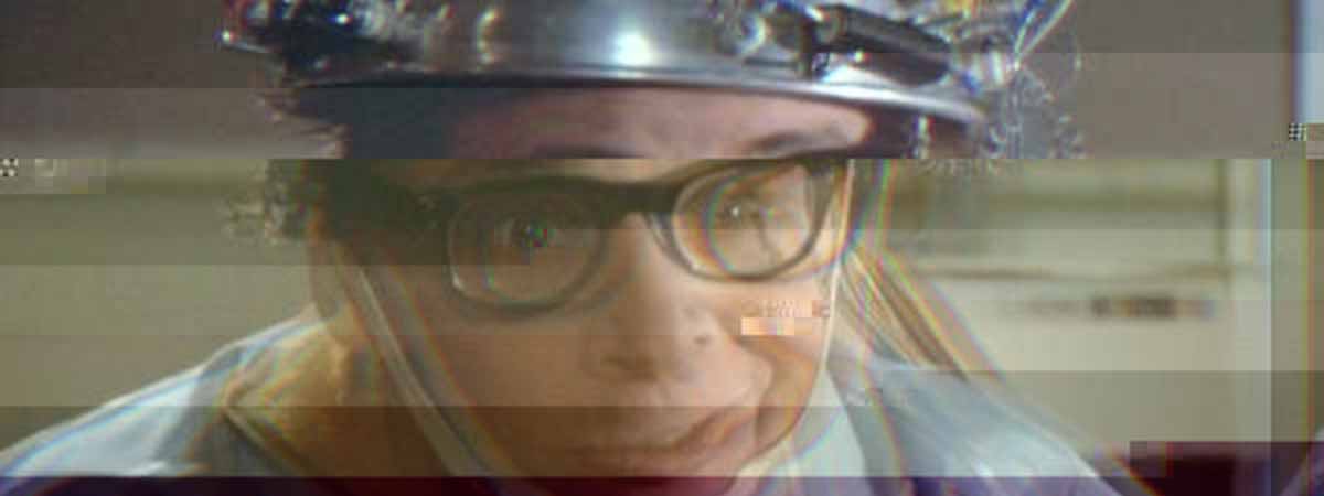 Rick Moranis in Ghostbusters with a brain scanner on his head